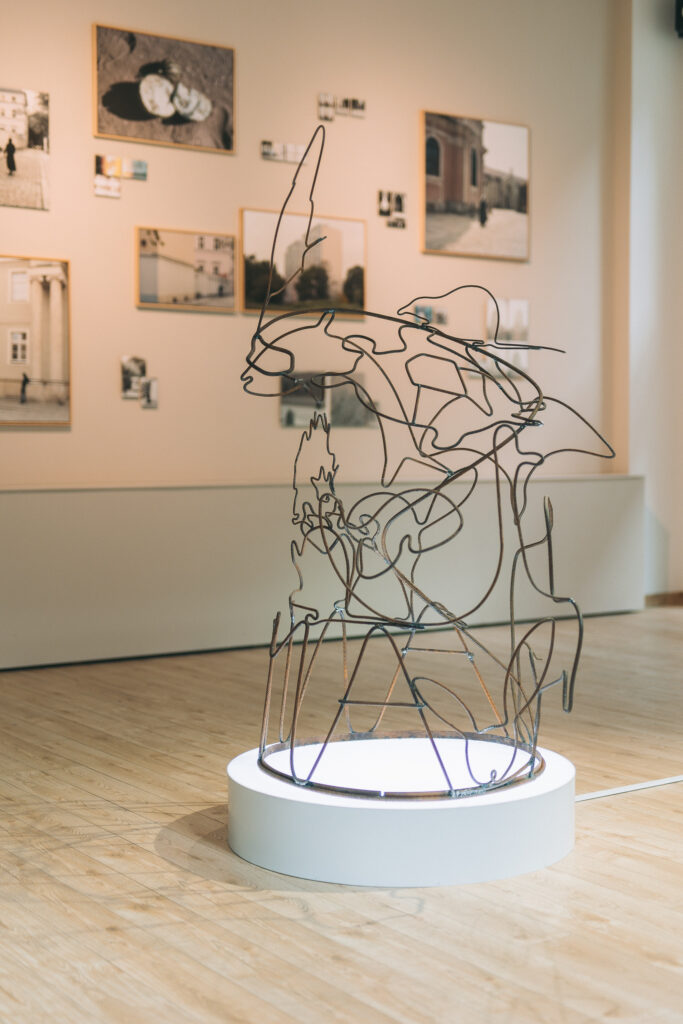 photo: sculpture made of metal rods bent into animal shapes 